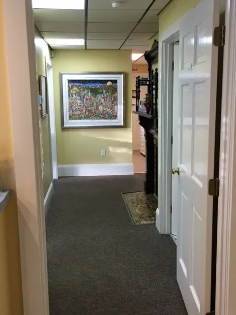 Office hallway with framed artwork
